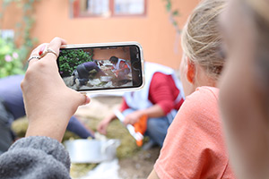 a picture in a picture of two people cooking