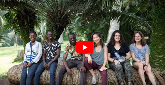 A group of students with Kwabena