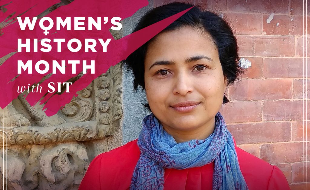 A woman with dark hair and a blue scarf faces the camera. An overlay reads "Women's History Month with SIT"